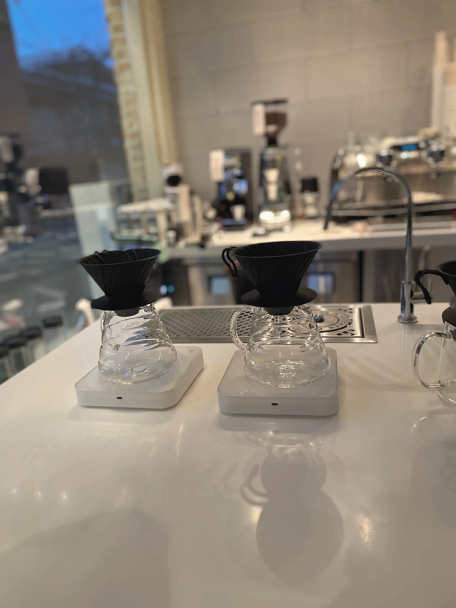 Pour over drippers set on a cafe counter