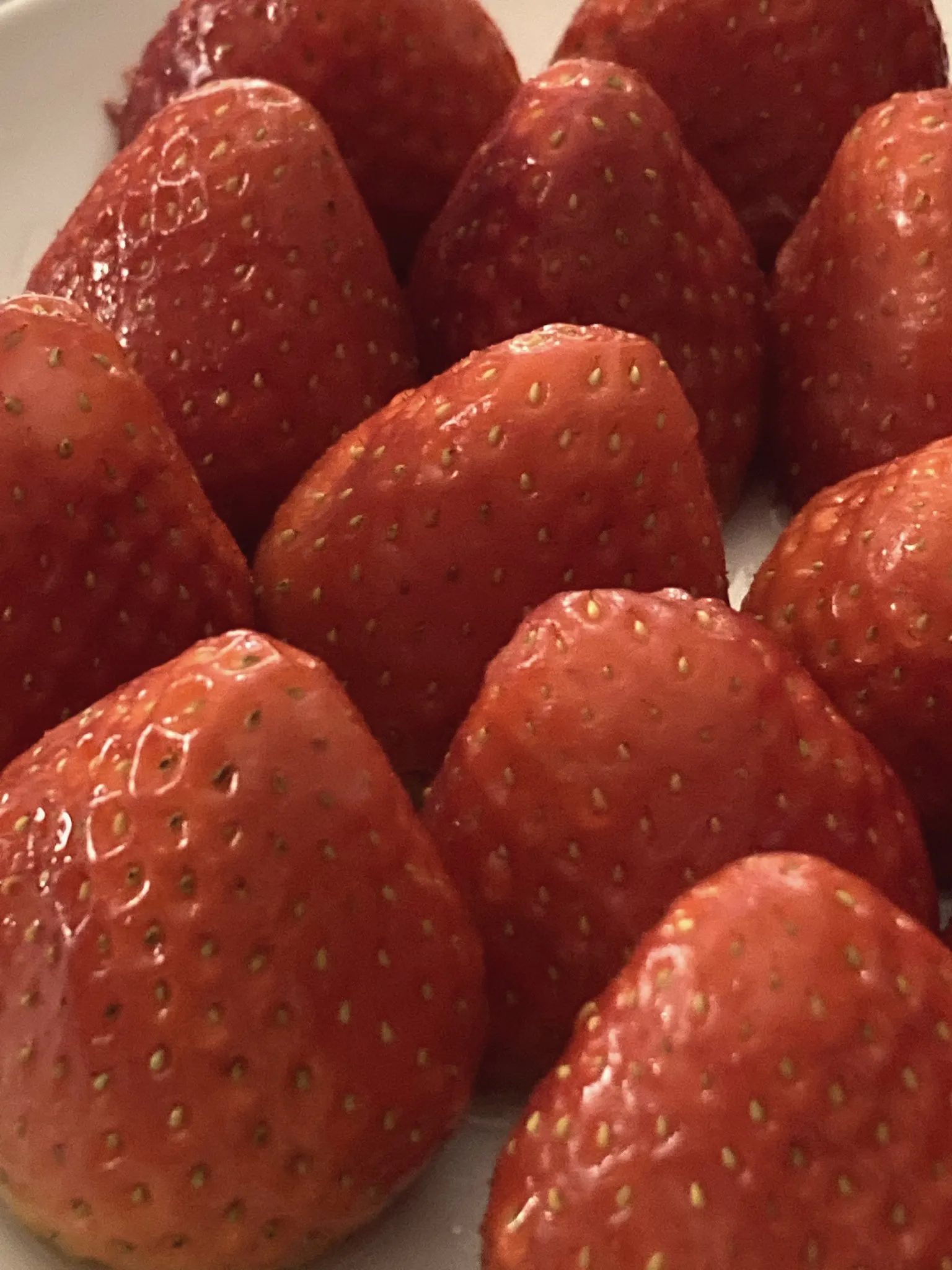 A bowl of fresh strawberries for dessert